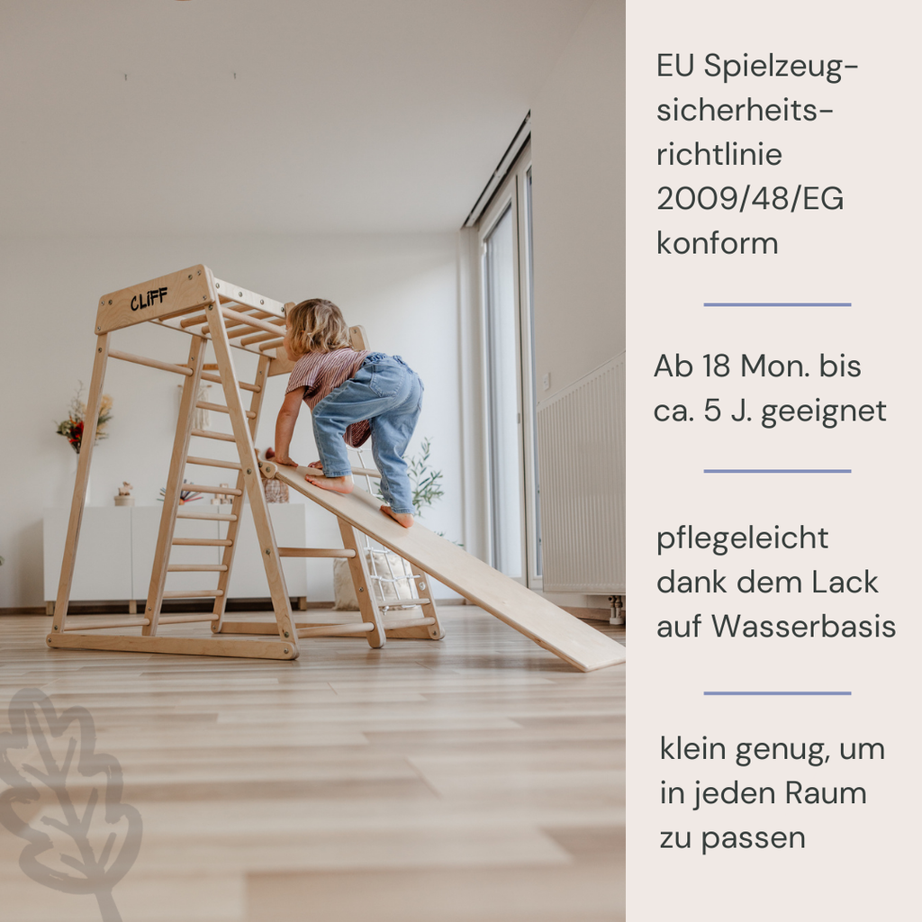 CLIFF Compact Klettergerüst aus Holz mit Rutsche und Trapez mit Kind und hinweisen zu EU Richtlinien
